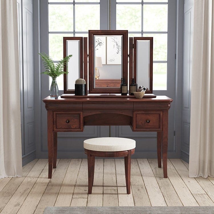 Antoinette dark mahogany dressing table with stool in a room set